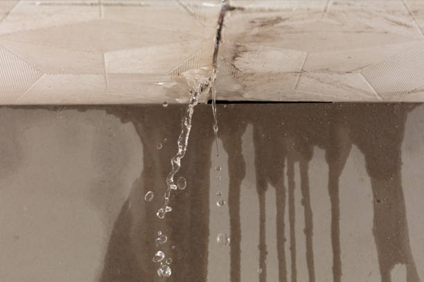 Professional Water Damage Restoration technician working in McDade, TX